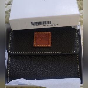 Dooney & Bourke Pebbled Grain Leather Wallet In Black